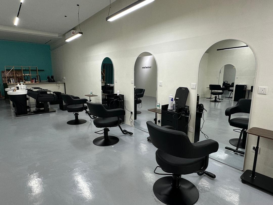 Wide view of Untitled Salon styling stations and wash area