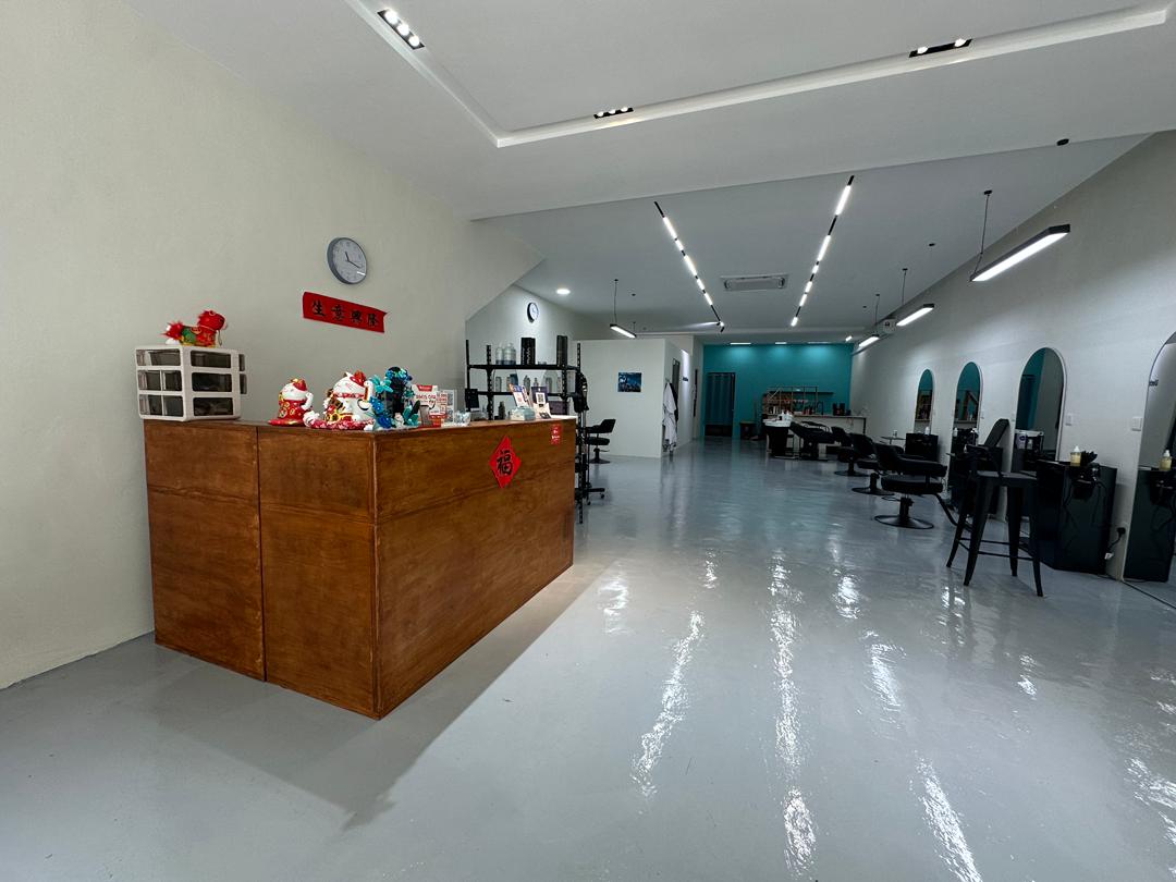 Reception counter and salon floor at Untitled Salon
